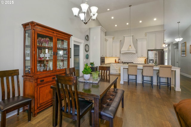 1715 York Butte Ave, Salem, OR 97306 - dining area featuring an inviting chandelier, lofted ceiling, dark wood-type flooring, and recessed lighting
