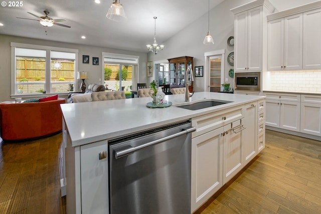1715 York Butte Ave, Salem, OR 97306 - kitchen featuring light countertops, stainless steel appliances, open floor plan, and a sink