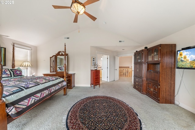 carpeted bedroom with vaulted ceiling and ceiling fan