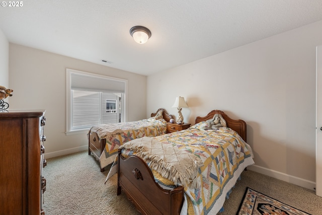 bedroom with light carpet