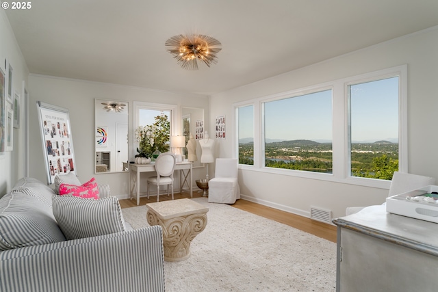 sunroom with a mountain view