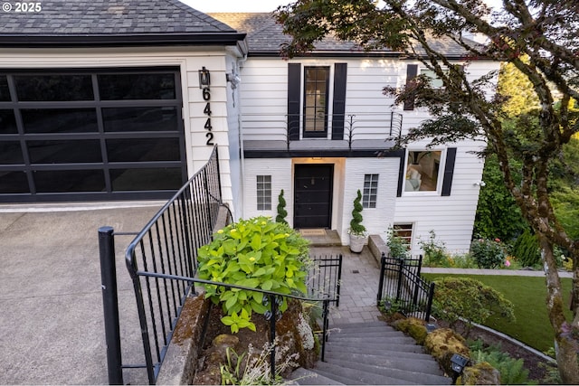 entrance to property featuring a garage