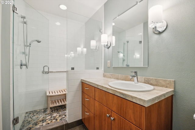 15 Cellini Ct, Lake Oswego, OR 97035 - bathroom with a shower stall, vanity, and a textured wall