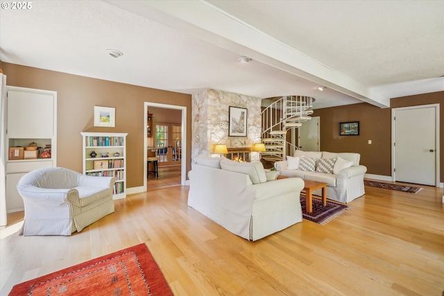 15 Cellini Ct, Lake Oswego, OR 97035 - living area with light wood-style floors, beamed ceiling, baseboards, and stairway