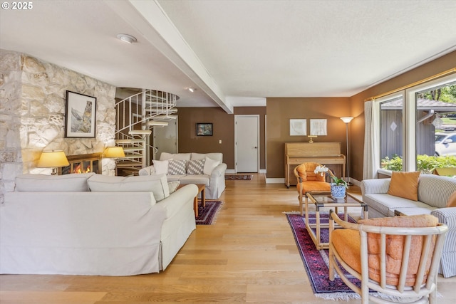 15 Cellini Ct, Lake Oswego, OR 97035 - living area with stairway, light wood-type flooring, baseboards, and beamed ceiling