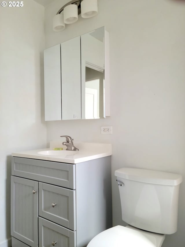 1063 Elrod Ave, Coos Bay, OR 97420 - half bathroom featuring toilet and vanity
