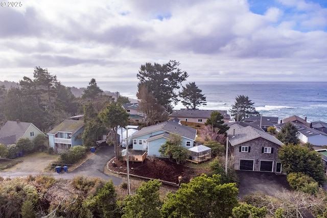 aerial view with a water view and a residential view