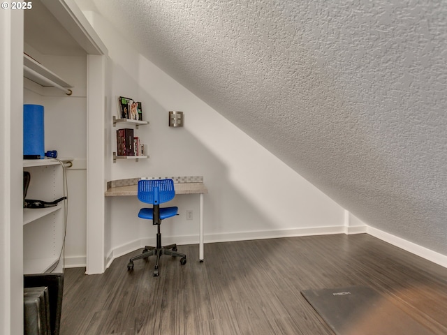 7913 SW Leiser Ln, Portland, OR 97224 - office space with a textured ceiling, dark wood finished floors, and built in desk