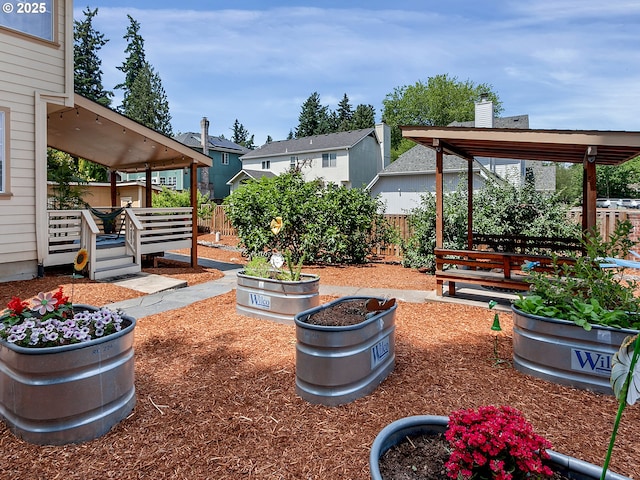 7913 SW Leiser Ln, Portland, OR 97224 - fenced backyard with a deck and a residential view