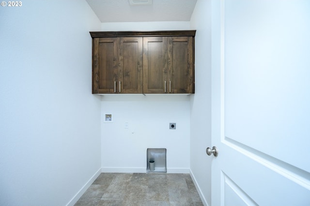 laundry room featuring washer hookup, hookup for an electric dryer, and cabinets