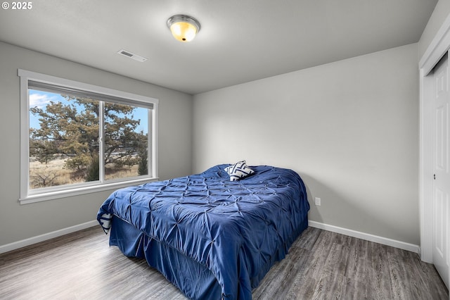 bedroom featuring hardwood / wood-style floors