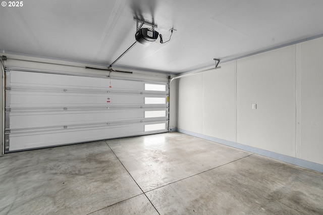 garage featuring a garage door opener