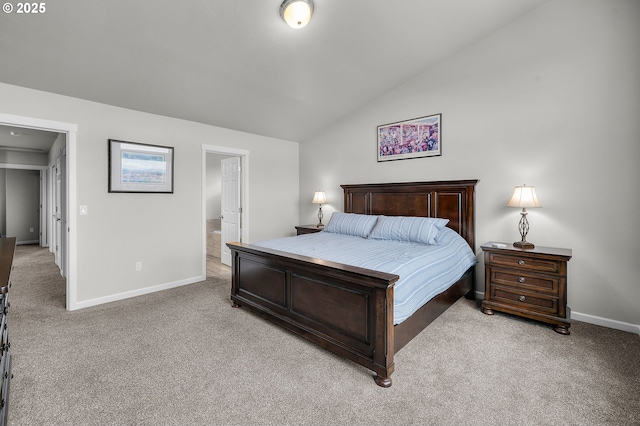 bedroom with light carpet and lofted ceiling