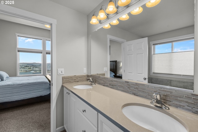 bathroom with backsplash and vanity