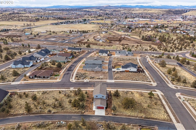 bird's eye view with a mountain view