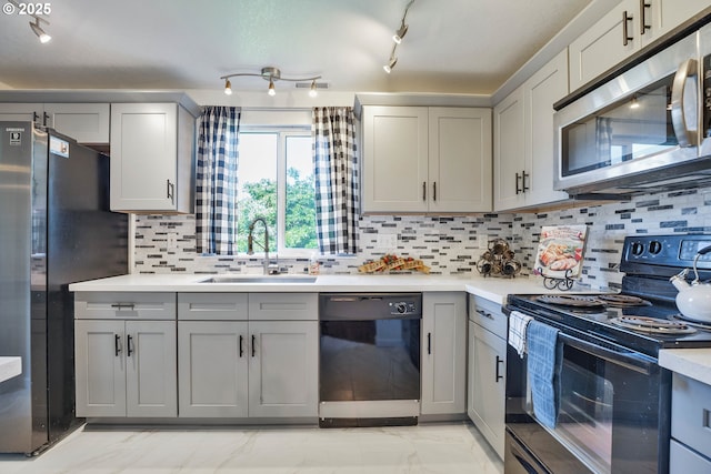 1819 SE 173rd Ave, Vancouver, WA 98683 - kitchen with black appliances, gray cabinets, and a sink