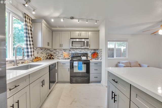 1819 SE 173rd Ave, Vancouver, WA 98683 - kitchen with stainless steel microwave, electric range, gray cabinets, and dishwashing machine