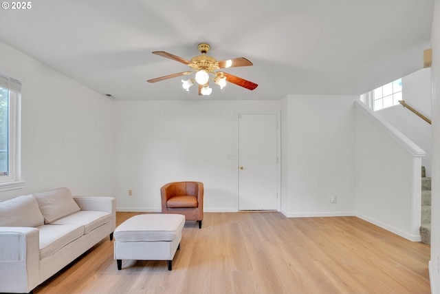 1819 SE 173rd Ave, Vancouver, WA 98683 - living room featuring ceiling fan, light wood-style floors, and baseboards