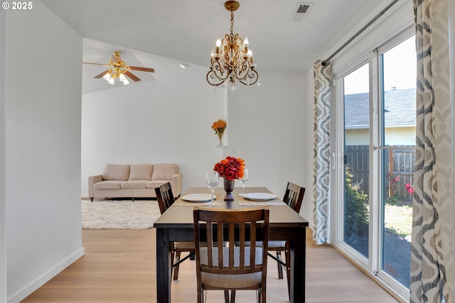 1819 SE 173rd Ave, Vancouver, WA 98683 - dining space featuring light wood-style flooring, a ceiling fan, a chandelier, and baseboards