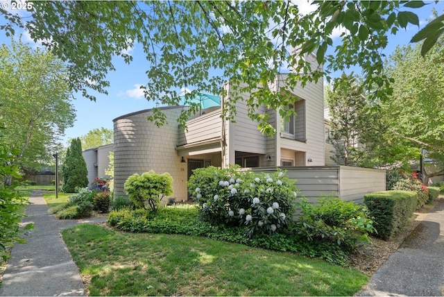 view of home's exterior featuring fence