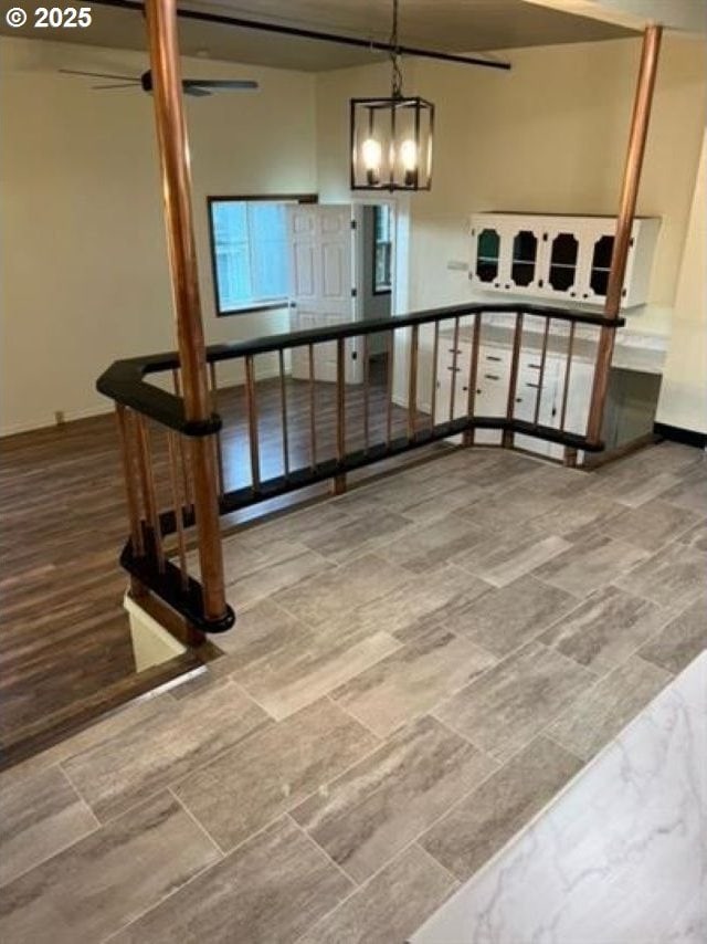 1127 6th Ave, Albany, OR 97321 - stairs featuring a chandelier