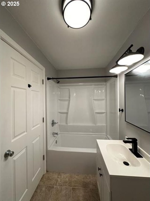 1127 6th Ave, Albany, OR 97321 - full bathroom with vanity,  shower combination, and tile patterned floors