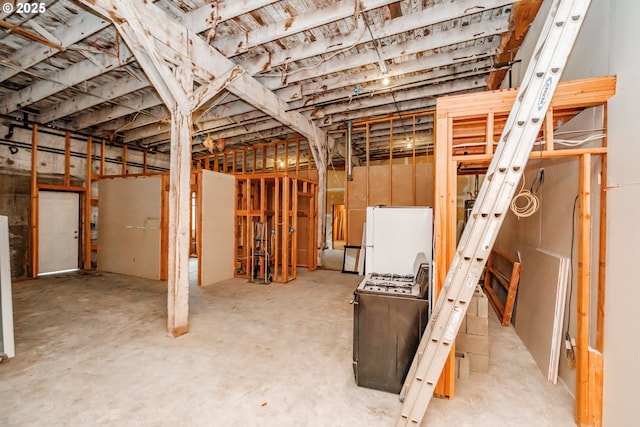 1127 6th Ave, Albany, OR 97321 - unfinished basement with freestanding refrigerator