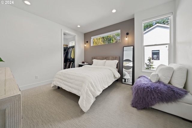 750 NE Province Ct, Camas, WA 98607 - bedroom featuring carpet flooring, recessed lighting, a walk in closet, baseboards, and a closet