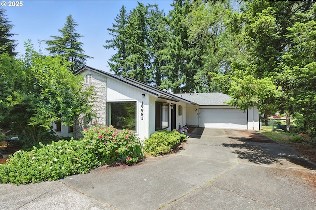 19985 SW Carlin Blvd, Beaverton, OR 97078 - view of front of home with a garage and concrete driveway