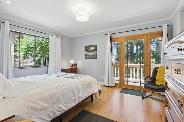 19985 SW Carlin Blvd, Beaverton, OR 97078 - bedroom with access to outside, crown molding, and light wood-style flooring
