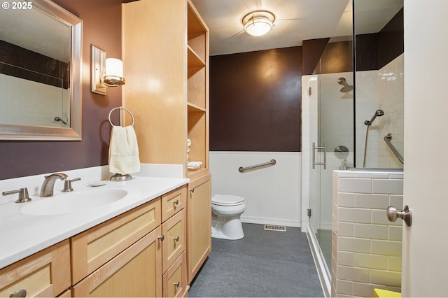 19985 SW Carlin Blvd, Beaverton, OR 97078 - bathroom with vanity, a shower stall, and wainscoting