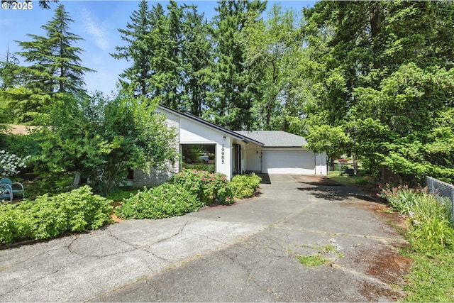 19985 SW Carlin Blvd, Beaverton, OR 97078 - view of front of home with asphalt driveway and an attached garage
