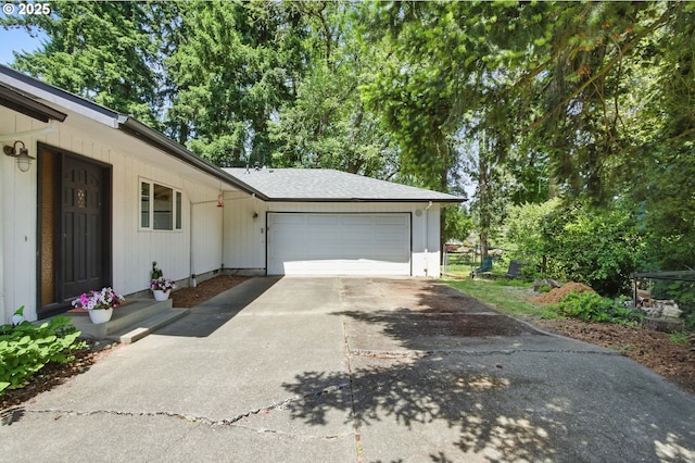 19985 SW Carlin Blvd, Beaverton, OR 97078 - view of property exterior with concrete driveway and a garage