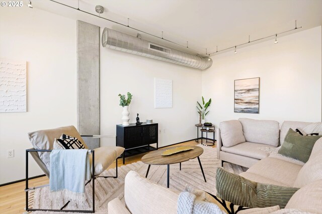 333 NW 9th Ave Unit 1323, Portland, OR 97209 - living area featuring light wood finished floors and track lighting
