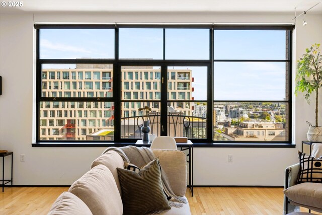 333 NW 9th Ave Unit 1323, Portland, OR 97209 - living room with track lighting and light wood finished floors