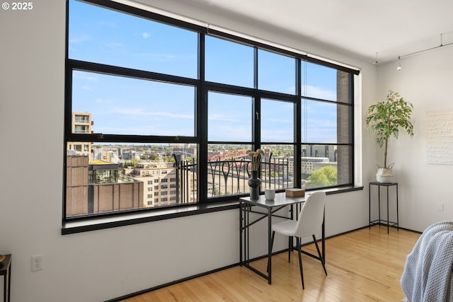 office area with hardwood / wood-style floors