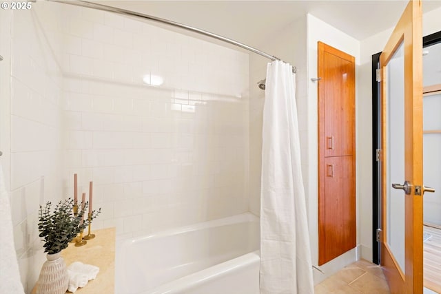 333 NW 9th Ave Unit 1323, Portland, OR 97209 - bathroom with shower / tub combo and tile patterned floors