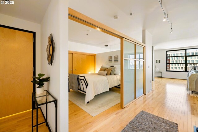 333 NW 9th Ave Unit 1323, Portland, OR 97209 - bedroom featuring light wood finished floors