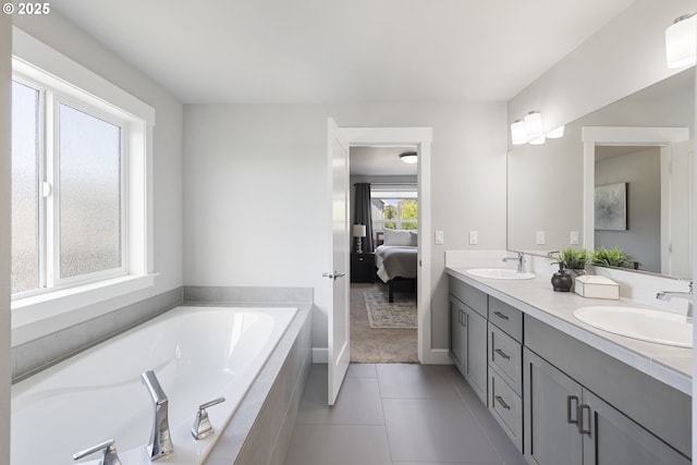21338 SW Simon Ter, Sherwood, OR 97140 - ensuite bathroom featuring double vanity, a bath, and tile patterned floors