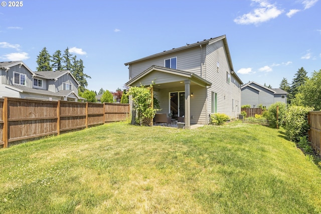 21338 SW Simon Ter, Sherwood, OR 97140 - back of house with a fenced backyard and a patio area
