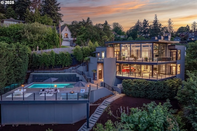 1551 SW Upper Hall St, Portland, OR 97201 - back of property at dusk featuring stairway