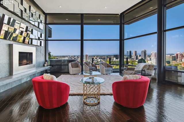 1551 SW Upper Hall St, Portland, OR 97201 - living room with expansive windows, a skyline view, plenty of natural light, hardwood / wood-style flooring, and a towering ceiling