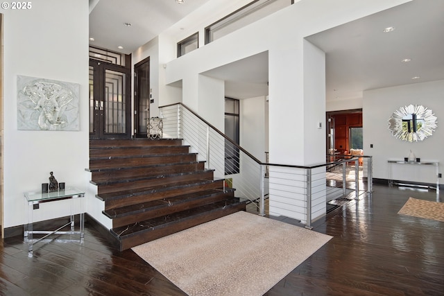 1551 SW Upper Hall St, Portland, OR 97201 - stairs featuring hardwood / wood-style floors and recessed lighting
