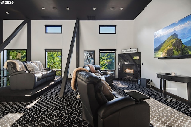 1551 SW Upper Hall St, Portland, OR 97201 - home theater room featuring a towering ceiling, carpet flooring, plenty of natural light, and recessed lighting