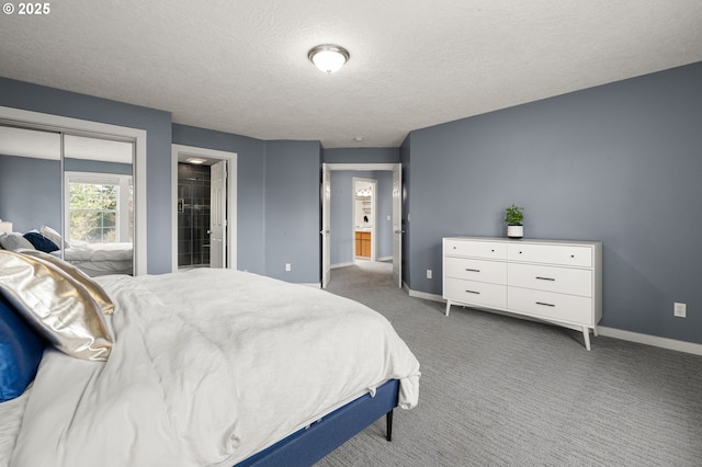 7820 SE 114th Ave, Portland, OR 97266 - bedroom featuring baseboards, a textured ceiling, and carpet