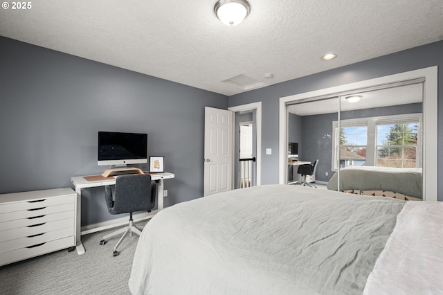 7820 SE 114th Ave, Portland, OR 97266 - carpeted bedroom featuring a desk, baseboards, and a textured ceiling