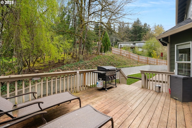7820 SE 114th Ave, Portland, OR 97266 - wooden terrace featuring grilling area and a fenced backyard