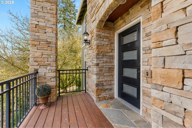 7820 SE 114th Ave, Portland, OR 97266 - property entrance featuring stone siding