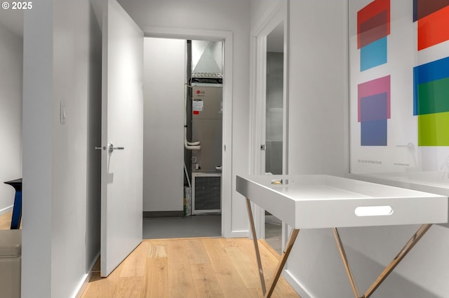 hallway with wood finished floors