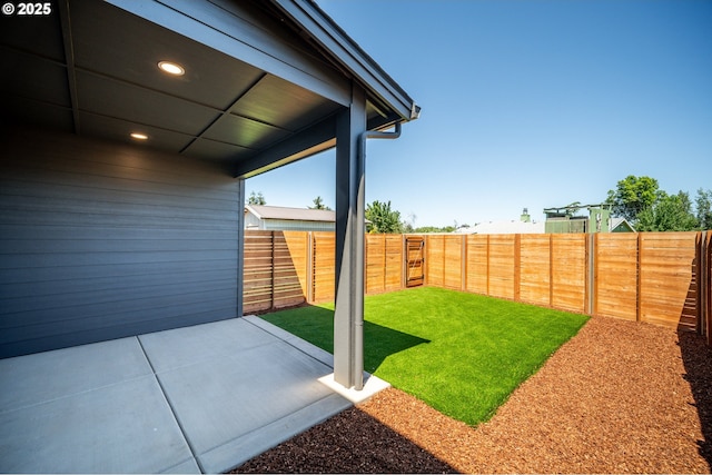 619 E Heintz St, Molalla, OR 97038 - fenced backyard featuring a patio
